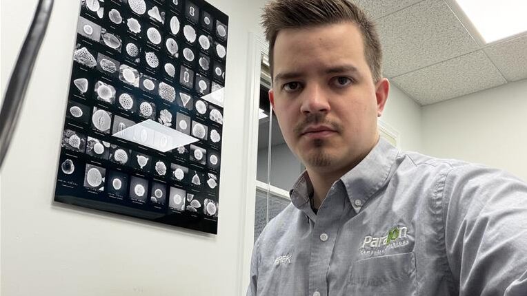 landscape view of a salesperson setting up their phone to record the speed test